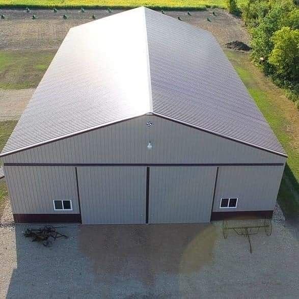 تركيب ساندوتش بانل على أسقف المستودعات